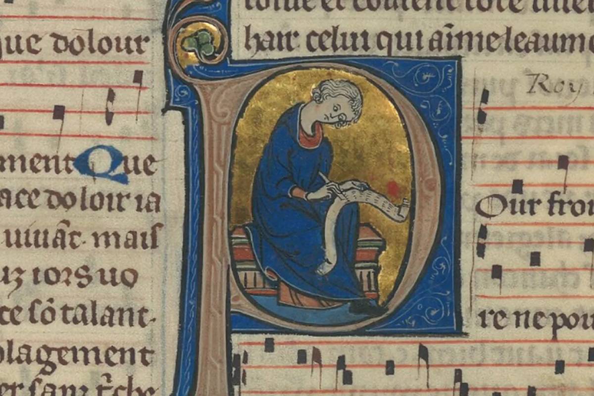 Medieval manuscript with illuminated letter depicting a scribe writing on a scroll, surrounded by musical notation and text.